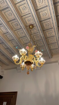 Our chandelier over bed