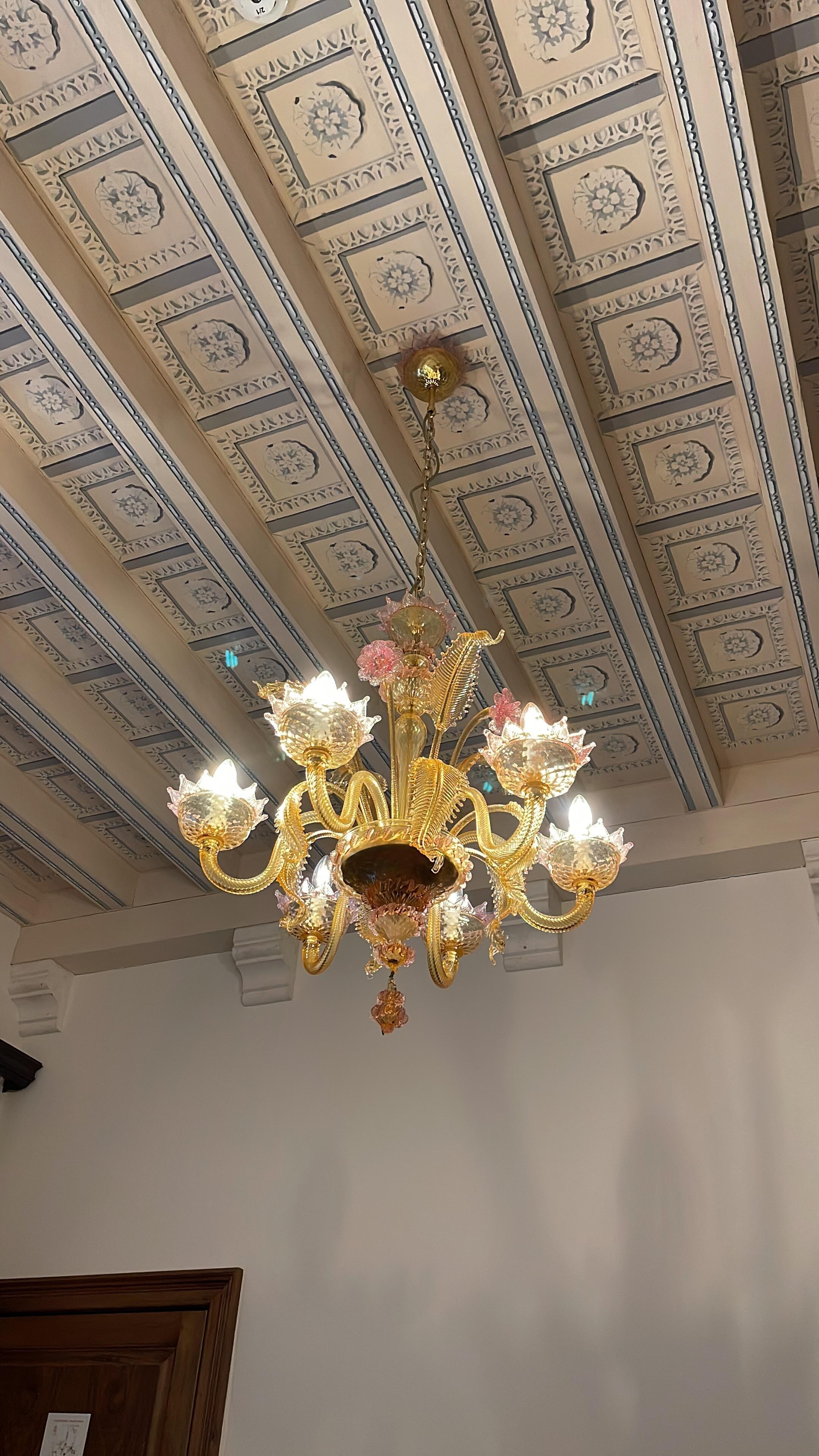 Our chandelier over bed