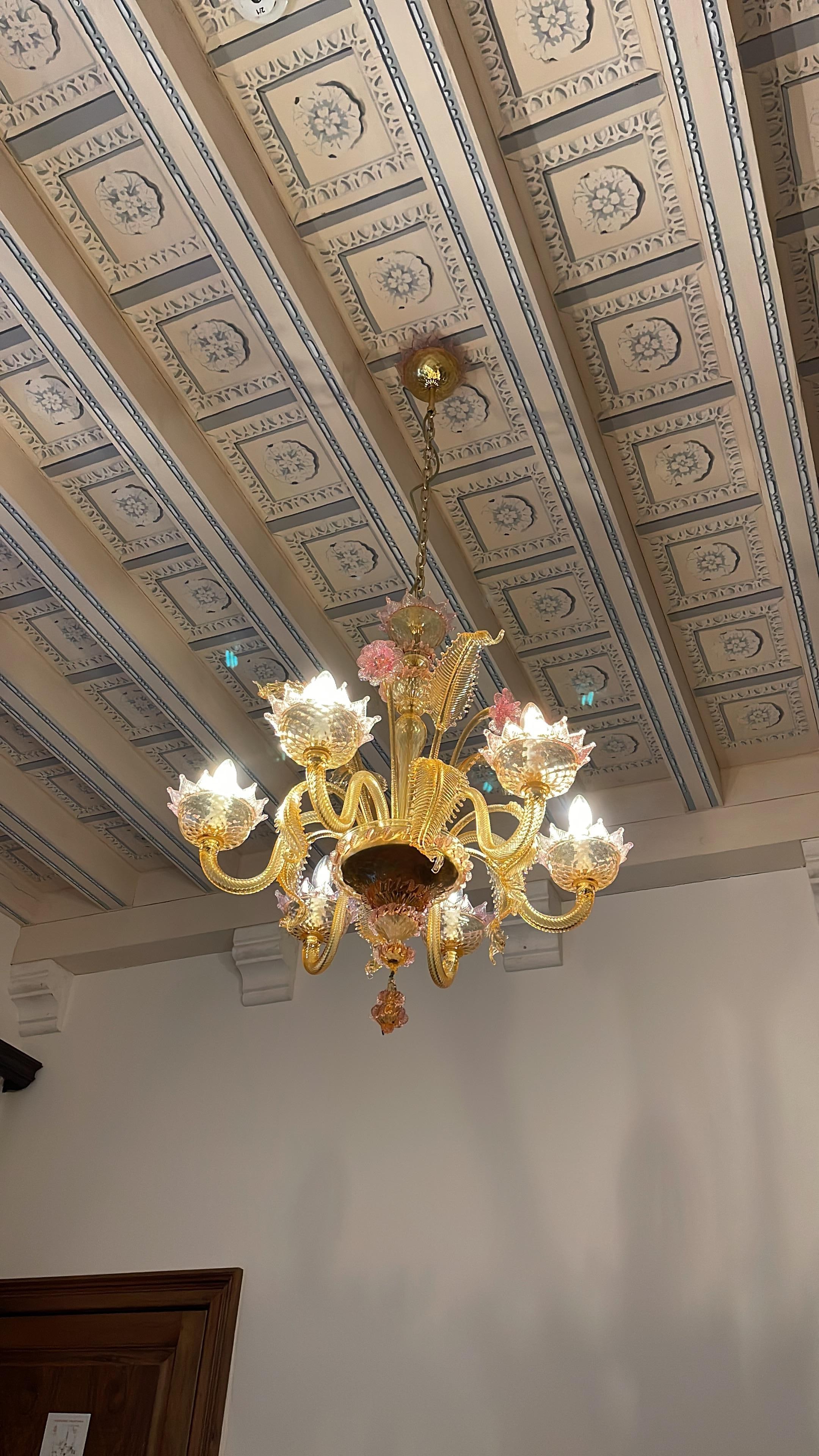 Our chandelier over bed