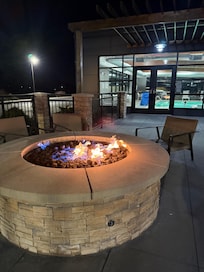 Sitting area outside ready for a fireside chat or idle unwinding.