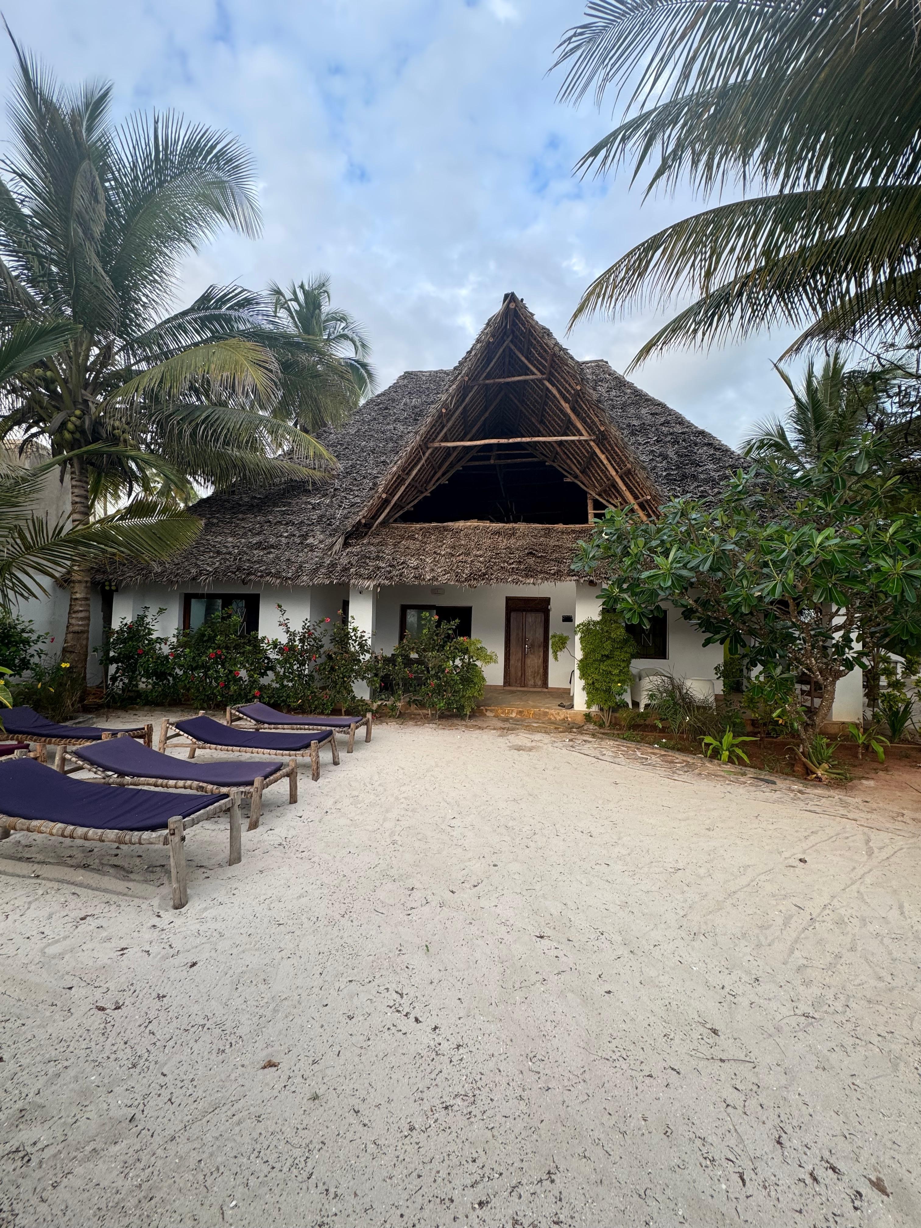 Looking back at the house from the gate to the beach
