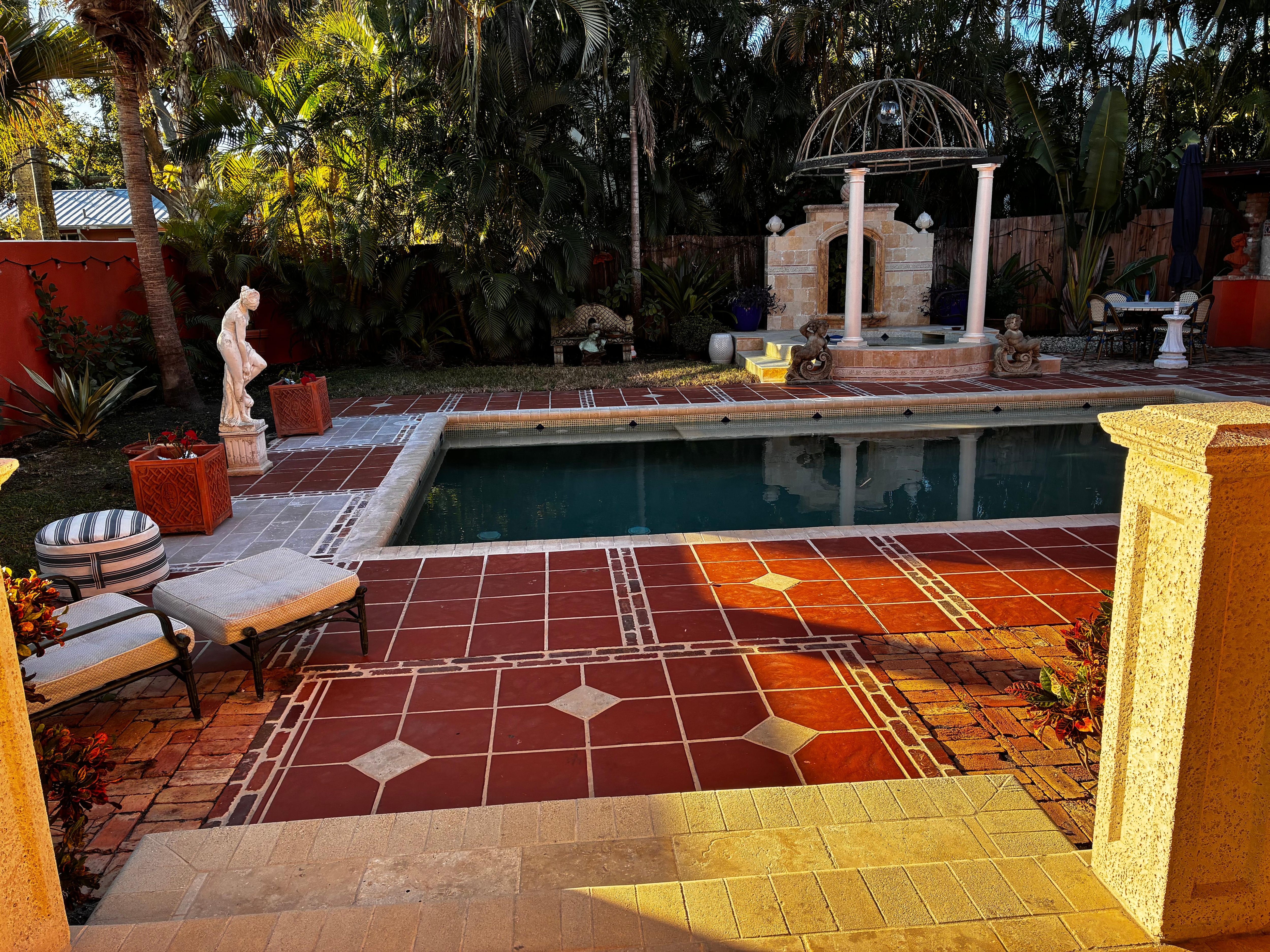 The pool is right off the patio and entrance to the room.