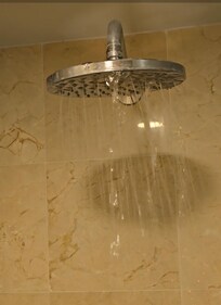 The photo doesn't do justice to the problem with the shower head. The problem was that the head was clogged and most of the water fell on the glass divider. The shower dripped horribly throughout the night.