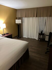 Missing the armchair. Nowhere to sit, but the office chair or the bed.