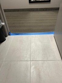 This is the way they replaced the missing bathroom threshold. 😳 They obviously knew it was missing and still put a guest in the the room.