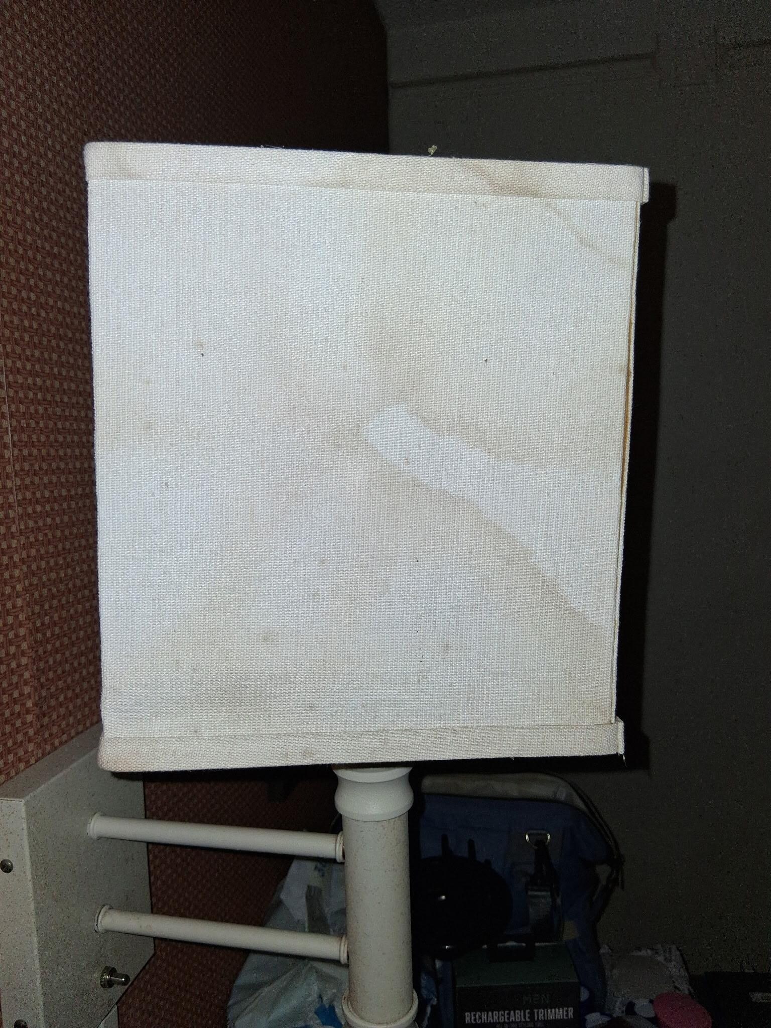 The lamp had stains and mold.