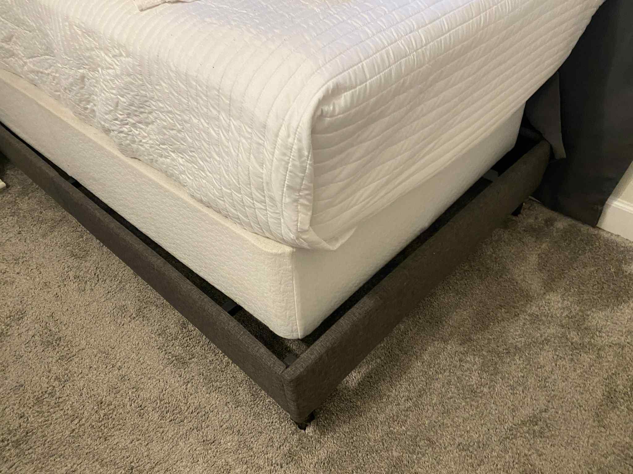 2nd bedroom where the mattresses dont fit and frames are sticking out.