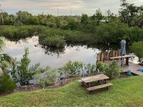 View of backyard from deck.
