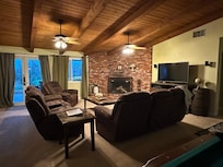 Living Room…good tv but no directions on remotes..comfy couch, carpet if ur a germaphobic…not compatible.