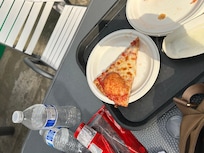 One very small slice of pizza $6.00???