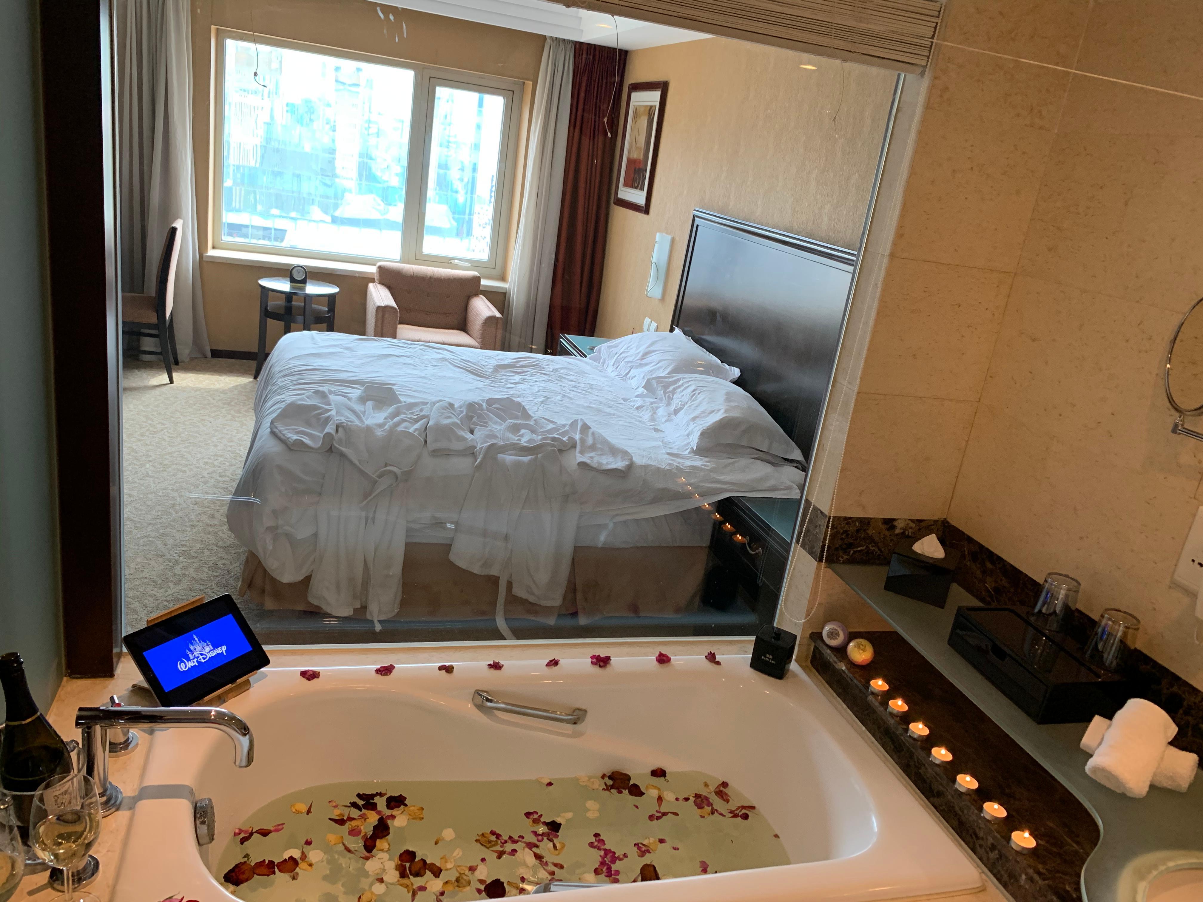 Bath tub in room and there is a blind you can roll down for privacy.