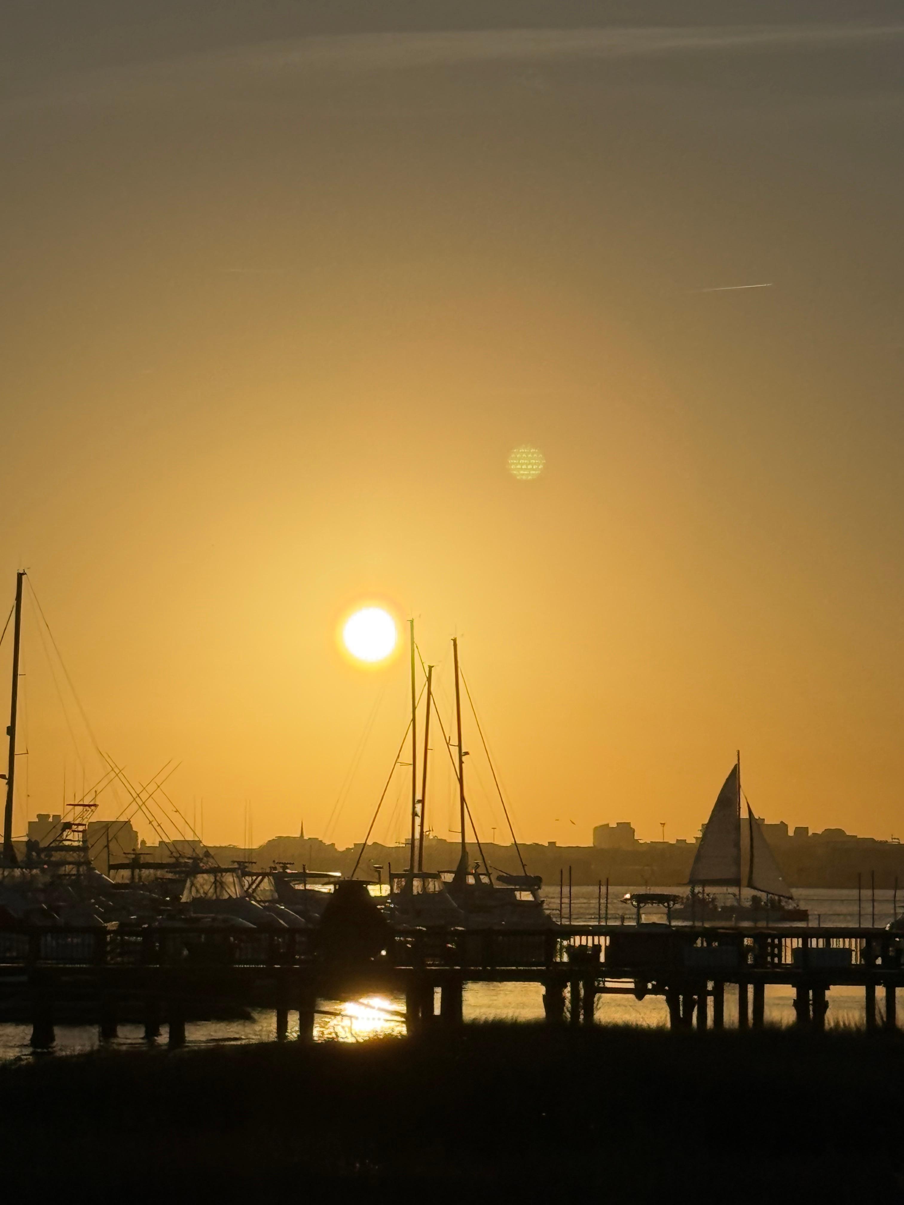 Sunset over the marina sitting by the fire. 