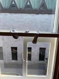 Dirty socks in window.