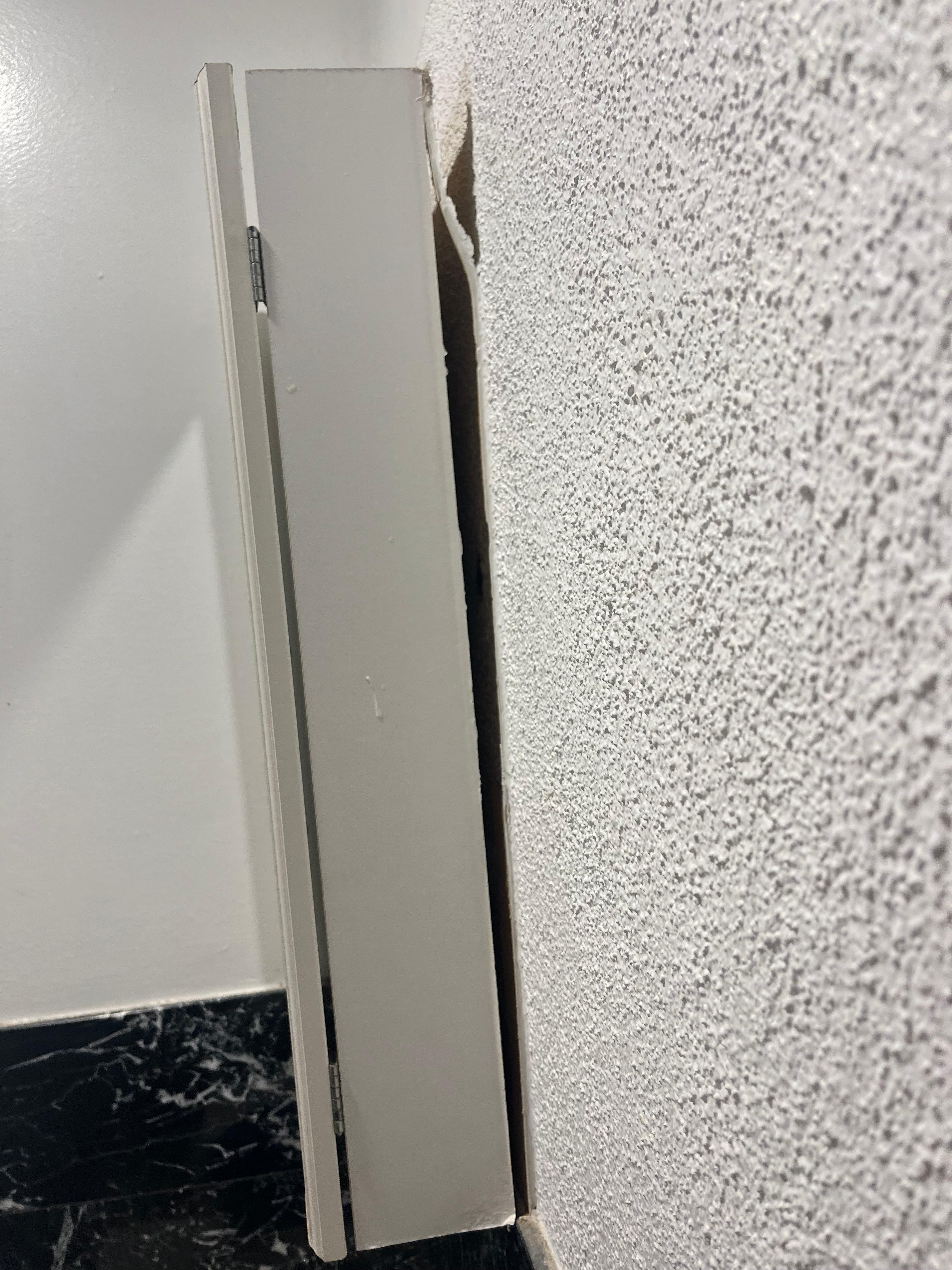Bathroom mirror falling off the wall