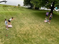 Using the corn hole game