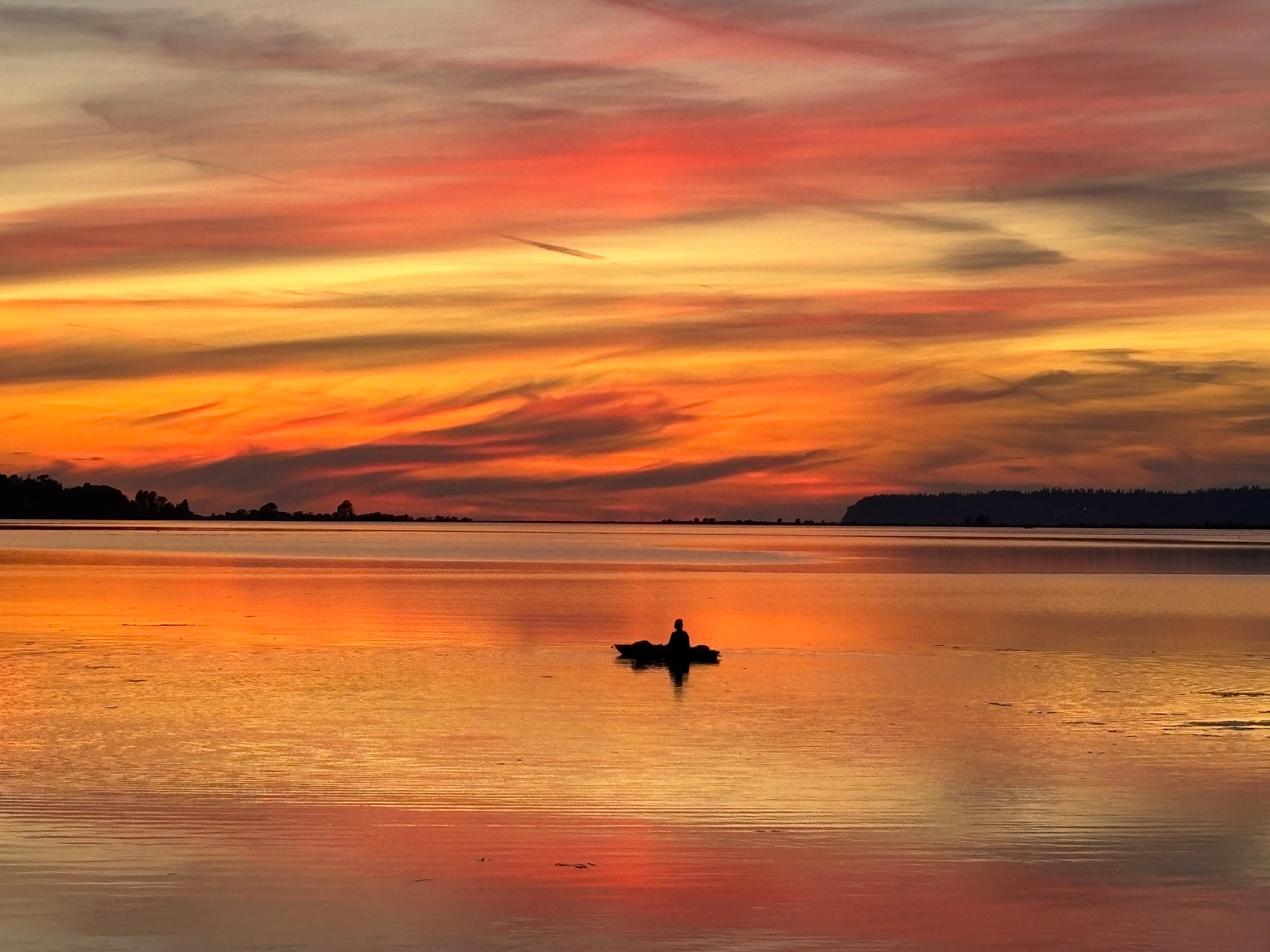 Kayaking at sunset right from the house at high tide. 