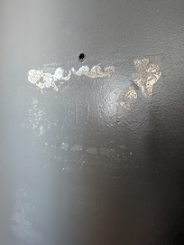 emergency exit map torn off the door