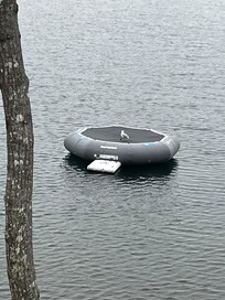 Floating trampoline on the pond