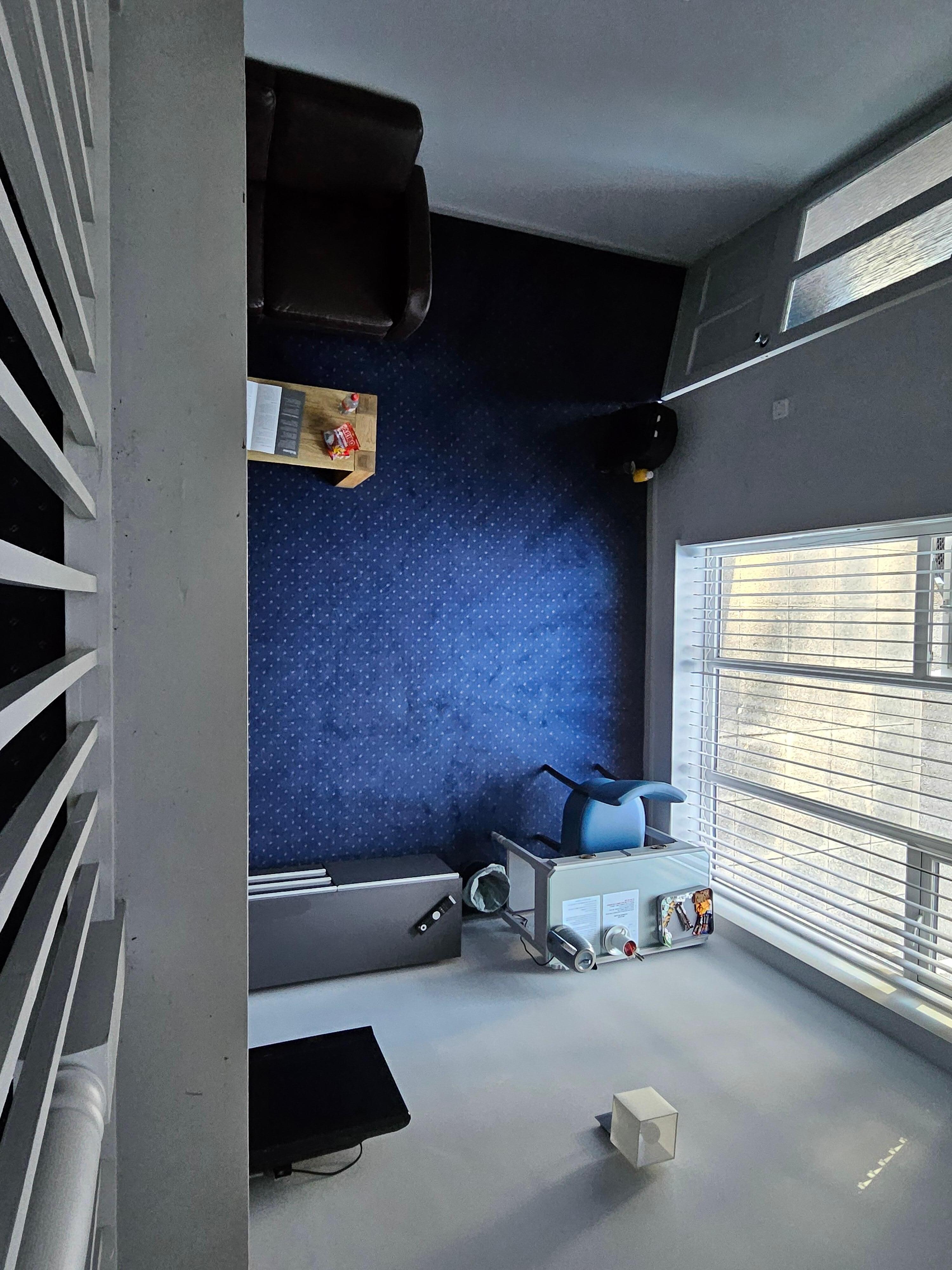 Looking down at living room and bathroom from bedroom gallery? 