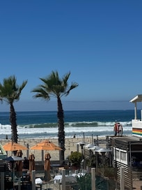 Beach from my balcony with the restaurant cropped out.