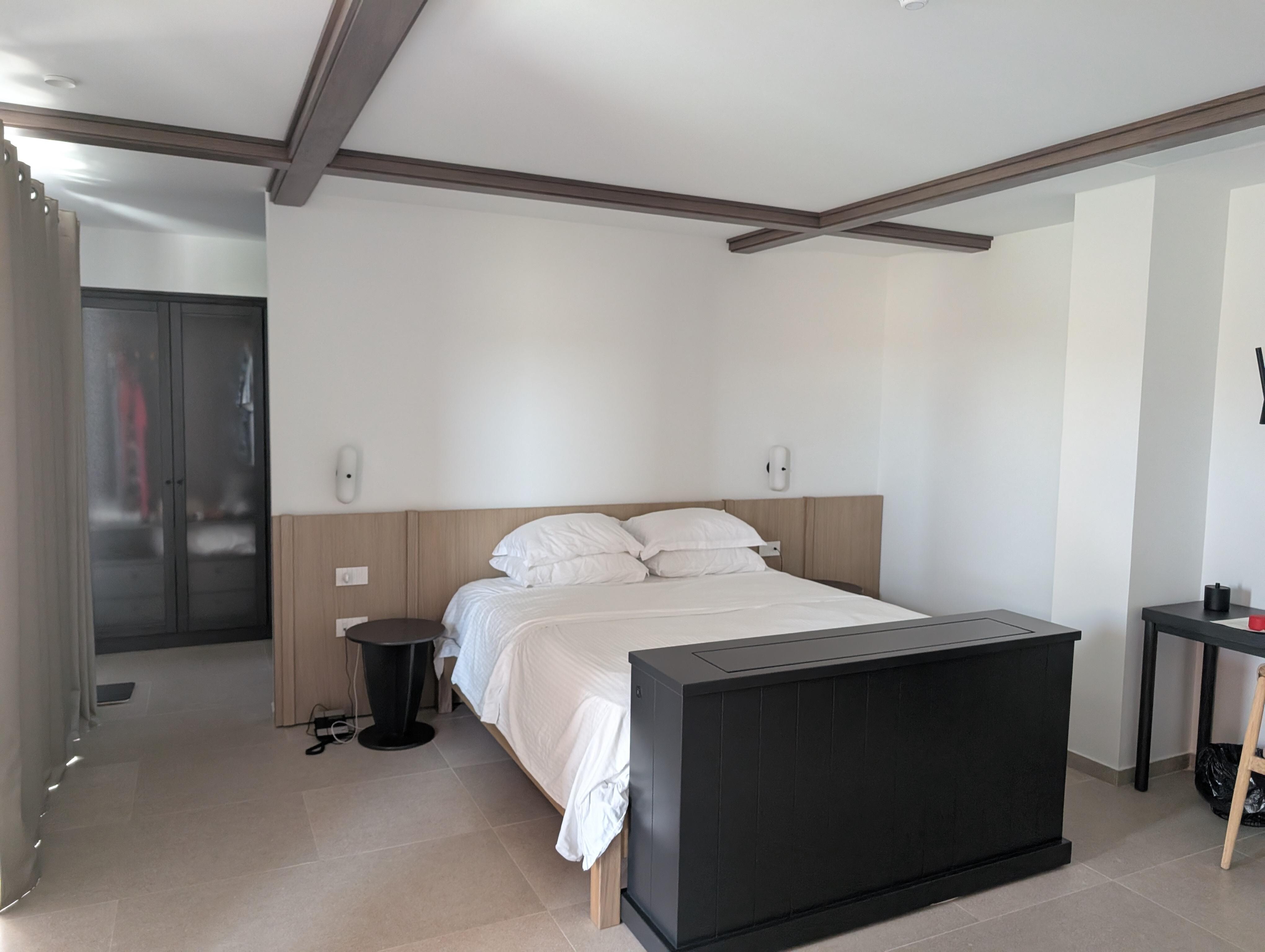 Bed in our ground floor honeymoon suite, not the 4 poster shown in photos 