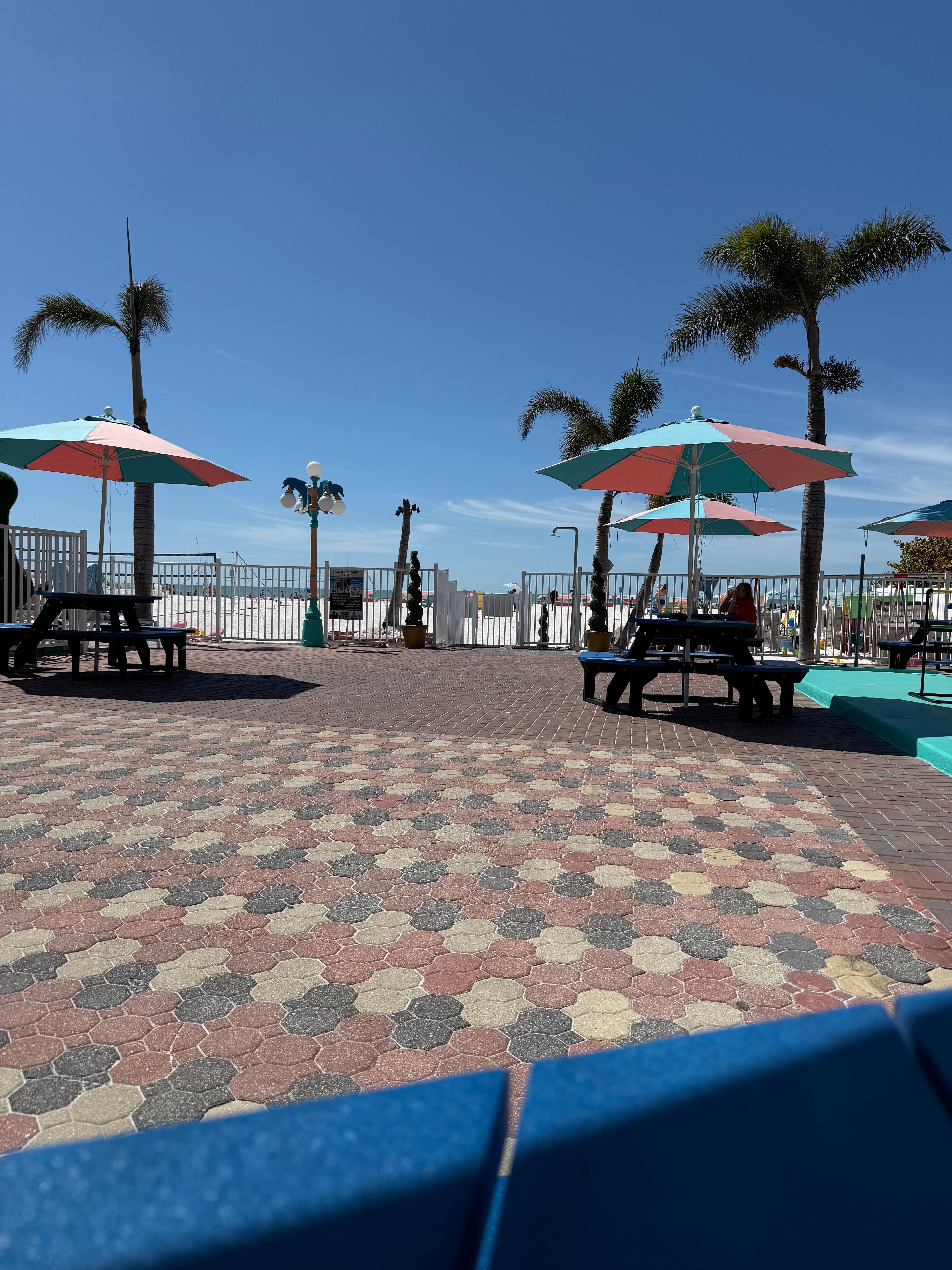 View of patio looking toward beach. 