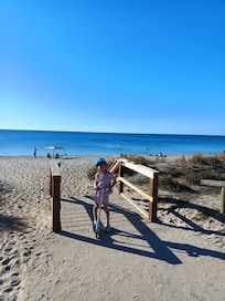Olivia checking out how close the beach was to our cabin 1 min walk