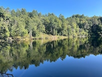 The mirror reflection and calm water