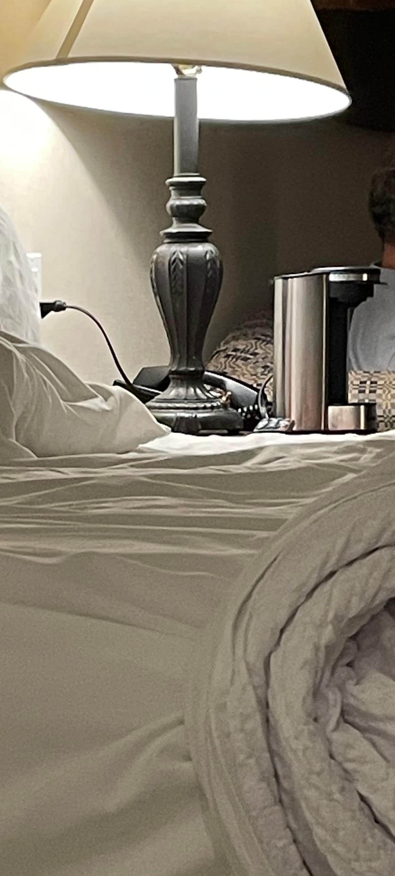 Coffee maker on night stand, not a big deal.