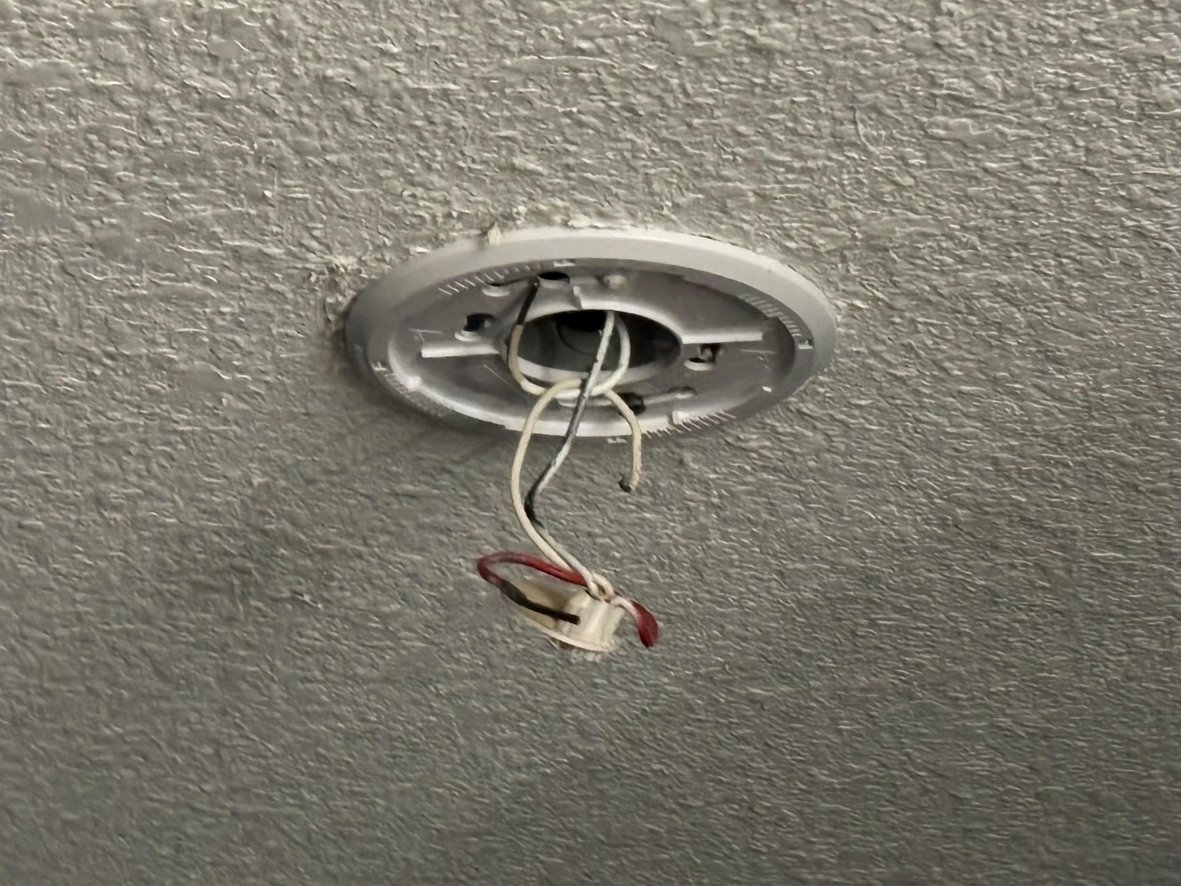 Exposed wiring in the bedroom