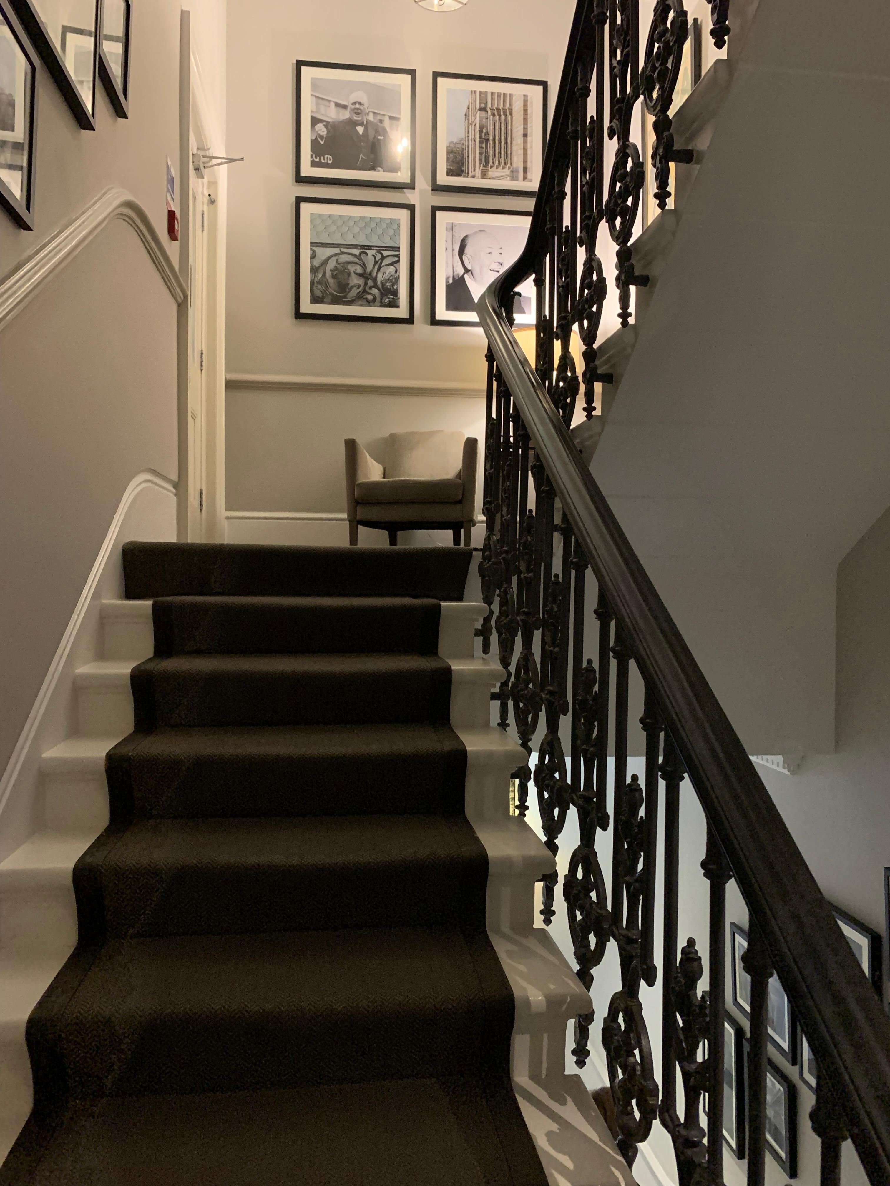 Quaint staircase and classic feel, but there are elevators too!