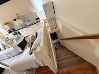 Stairs to downstairs bedroom