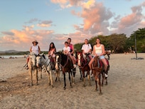 Horseback riding on the beach