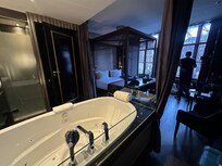 The hot tub in our room and the deluxe canal room