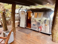 Cylinder like camper with plenty of room inside.