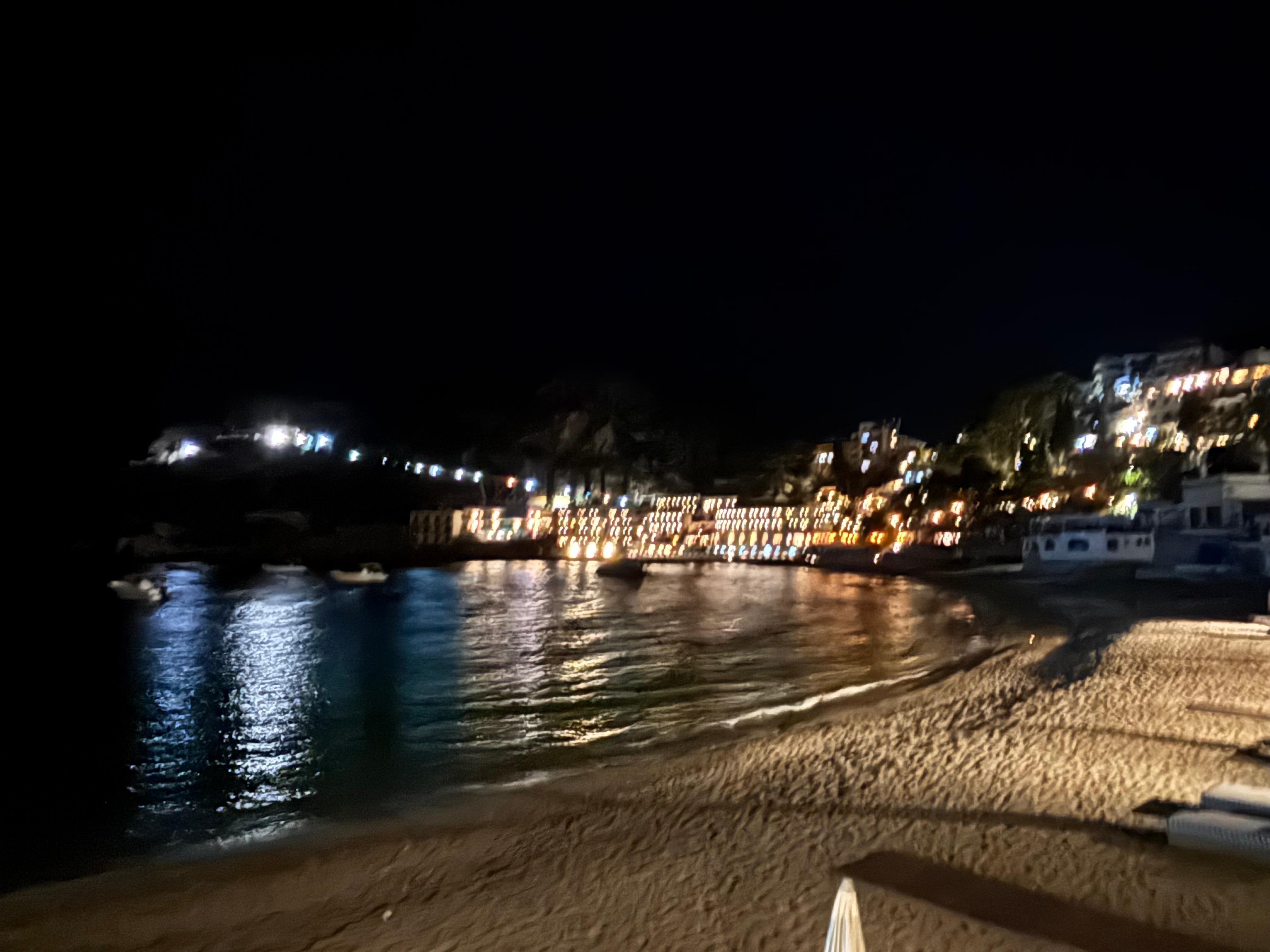 Nighttime view of Mazarro Bay