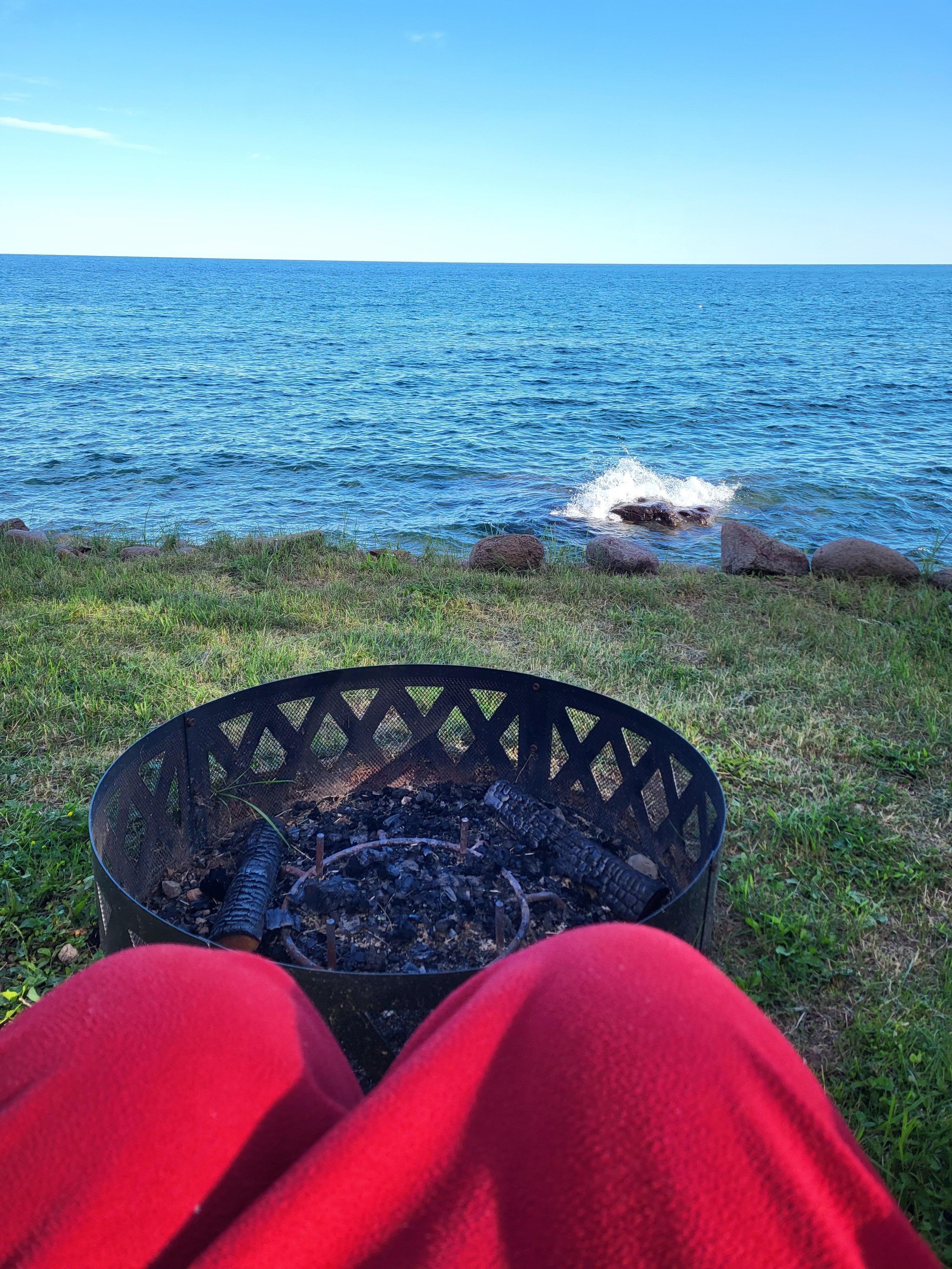View from andinrondack chairs with firepit.
