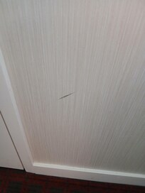Ding on wall