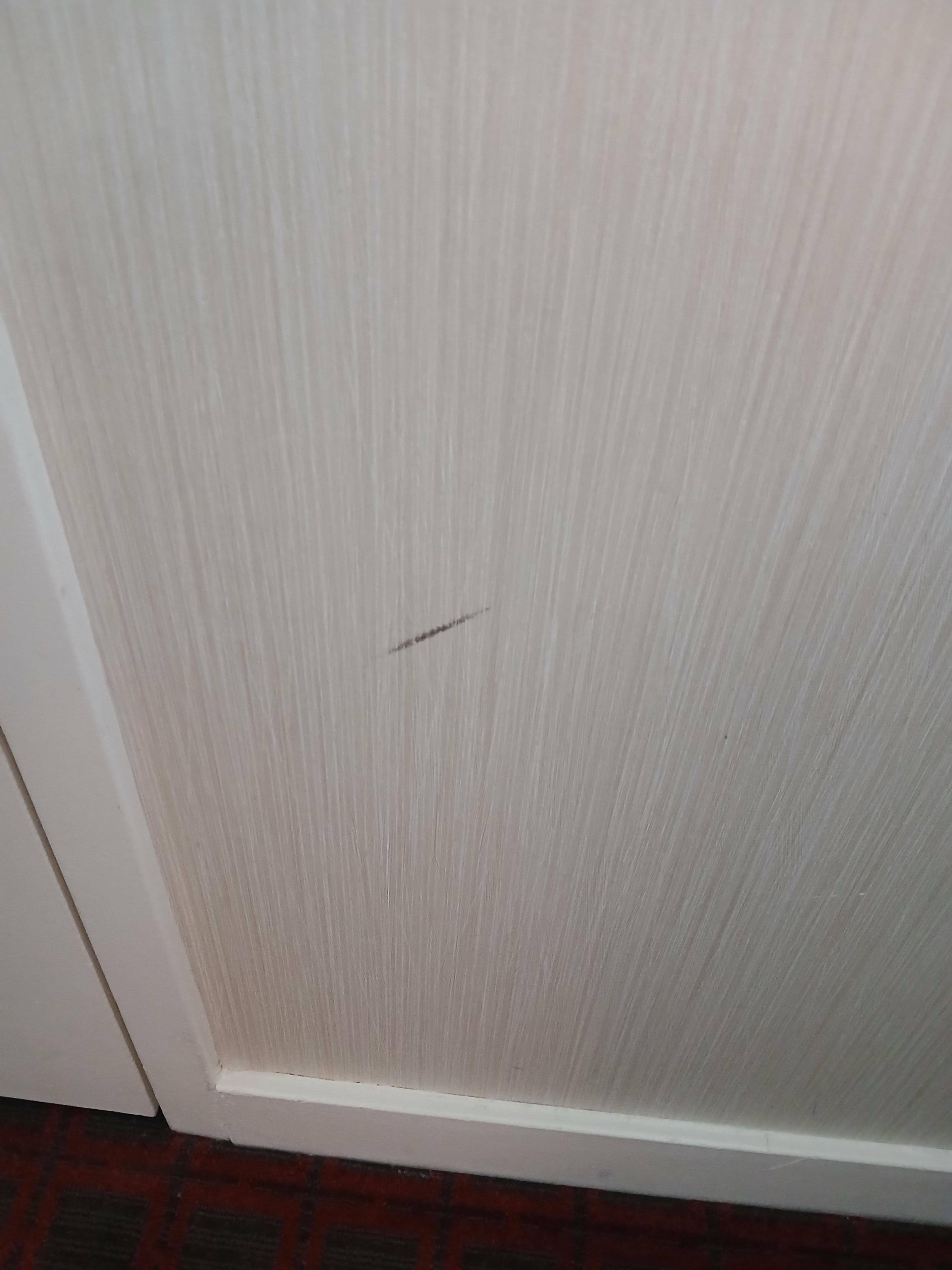 Ding on wall