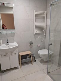 Modern, clean bathroom.