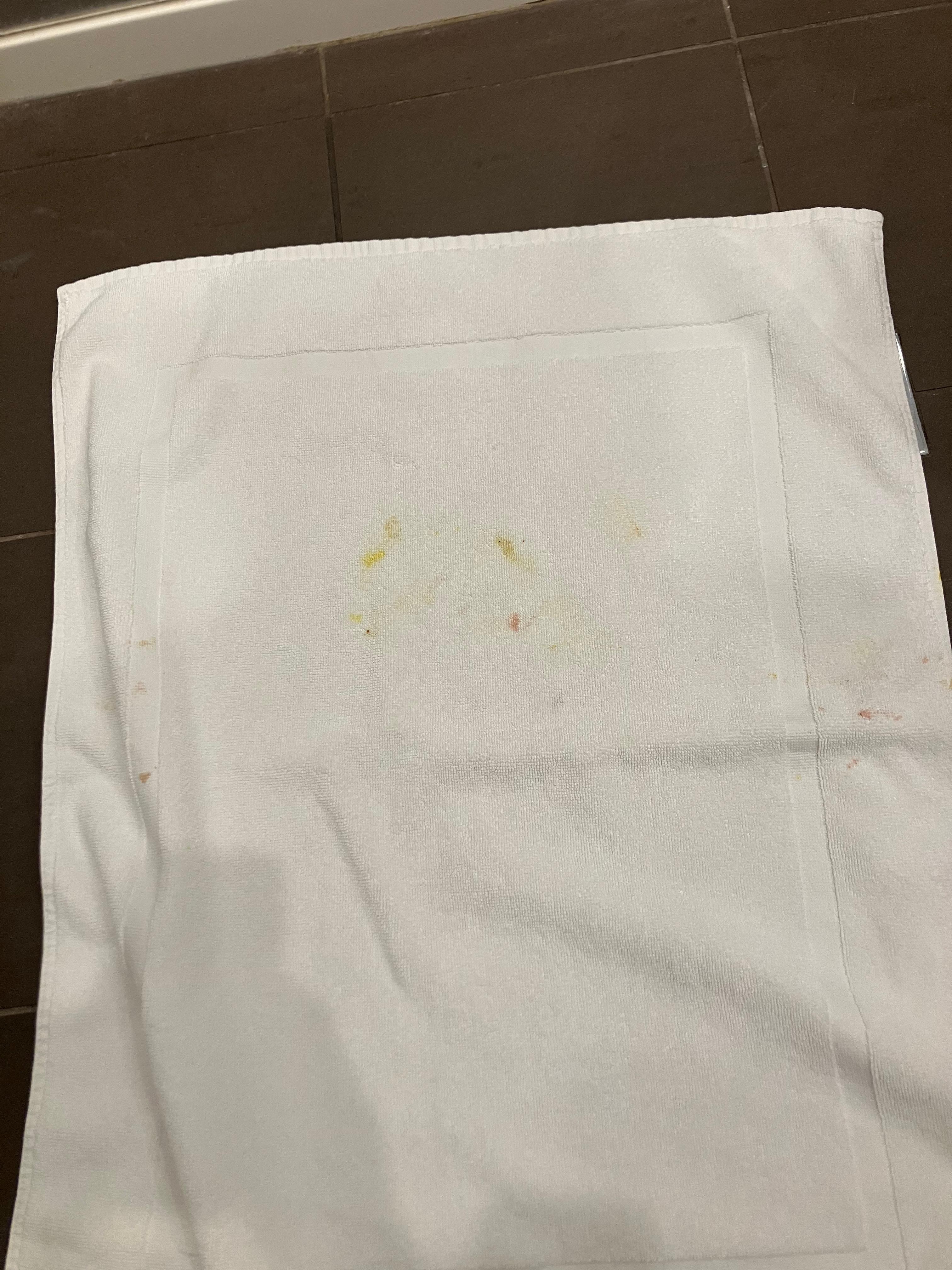 Stains on clean bath mat