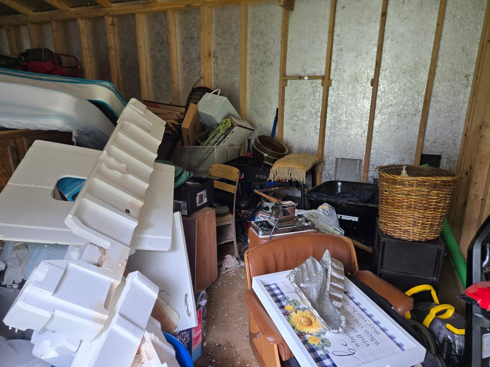 Advertised grill buried in shed which STINKS!