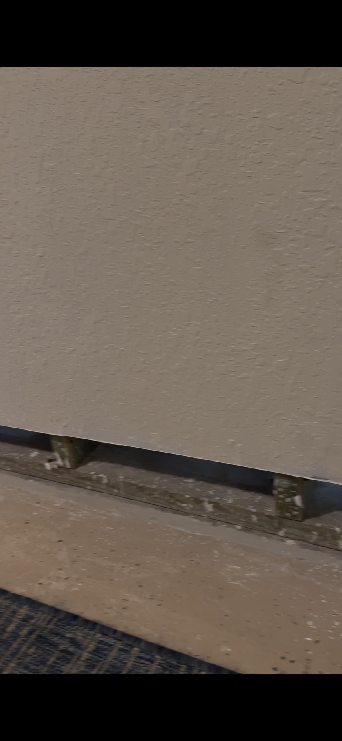 drywall cut away from wall