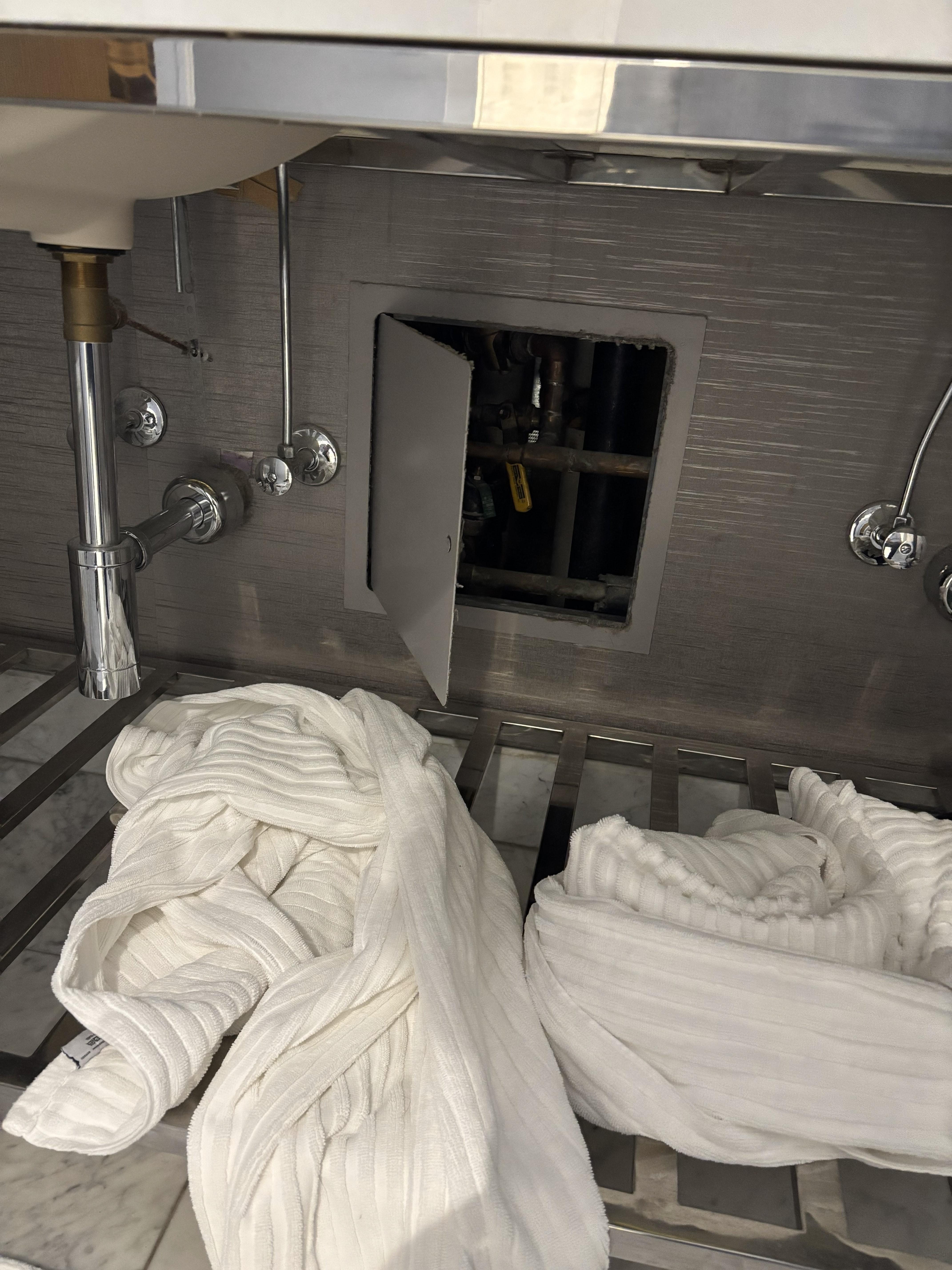 Open plumbing under the sink