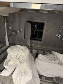 Open plumbing under the sink