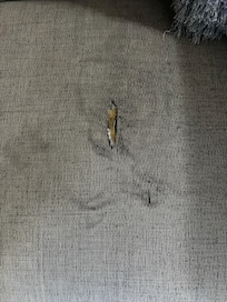 Hole in the house with stain