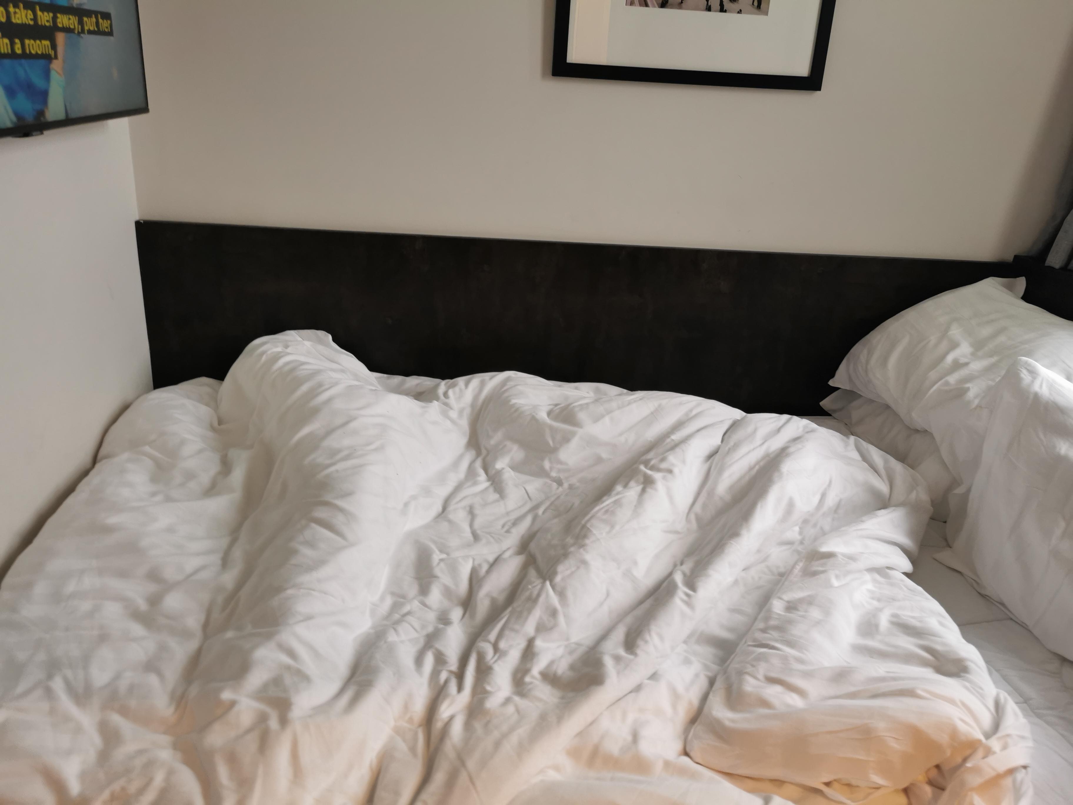 No room to move on three sides of the bed. 