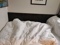 No room to move on three sides of the bed.