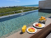 Rooftop plunge pool room with room service