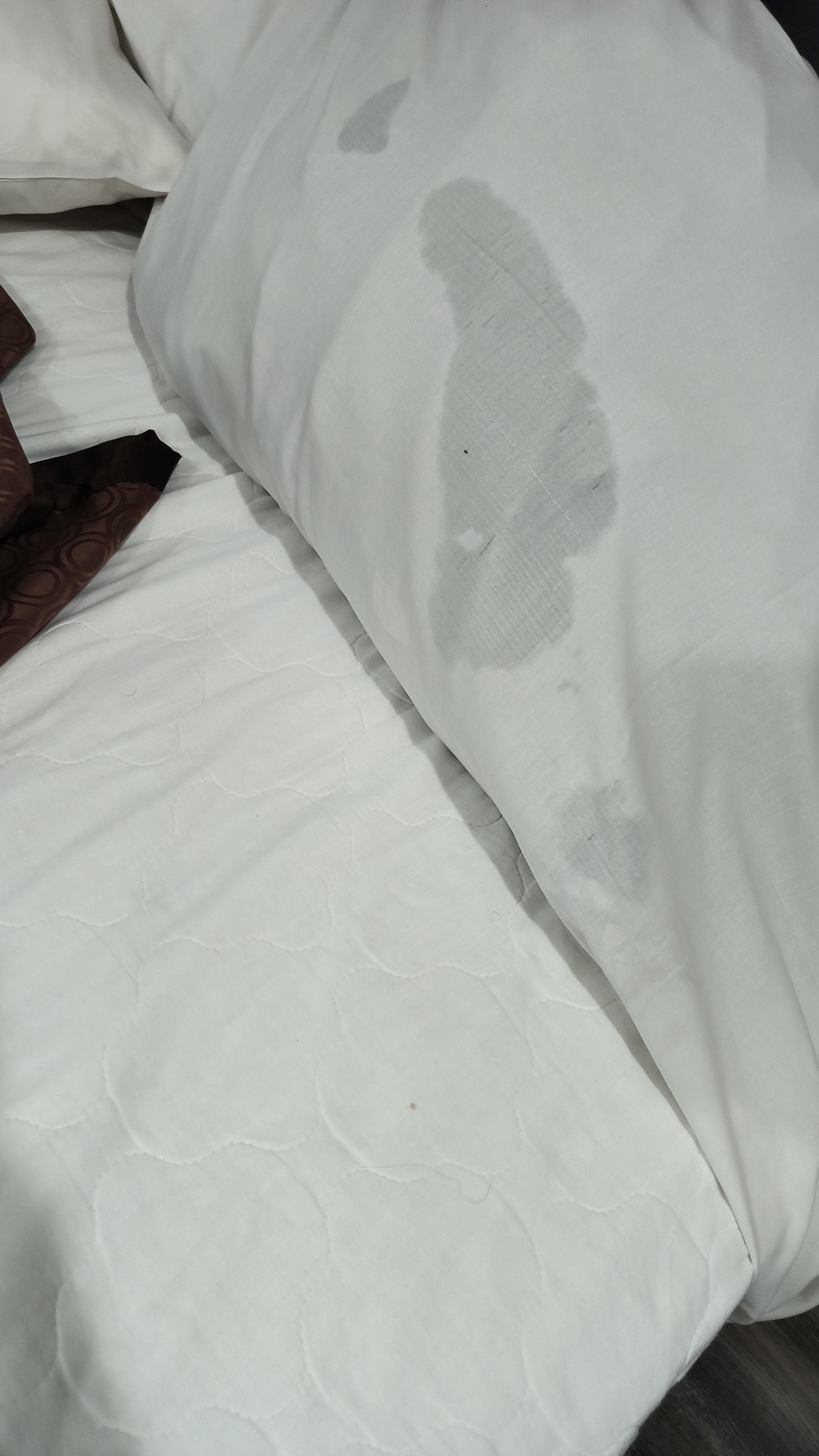 Semen that was hidden under the sheets.